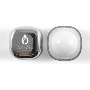 A square lip balm container with a shiny silver lid and a clear base, featuring a logo on the lid.