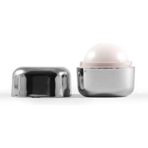 A Ritz Cube Lip Balm in a sleek silver container, with the lid removed to reveal the lip balm.