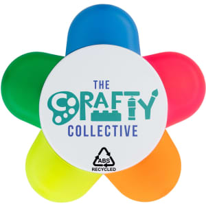 A flower-shaped highlighter featuring pink, blue, green, and orange sections, with a central logo.