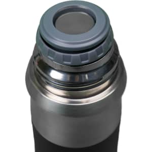 A drink bottle with a metallic finish and a grey lid featuring a circular opening, designed for liquid containment.