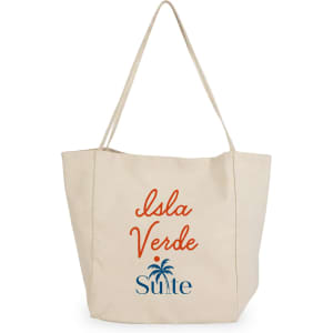 A cream-coloured tote bag featuring a logo and the text "Isla Verde". It has long handles for carrying.