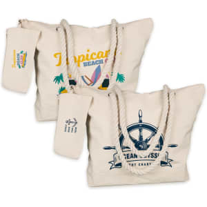 Ariel Canvas Tote Bag in beige featuring decorative graphics and rope handles, accompanied by a matching pouch.