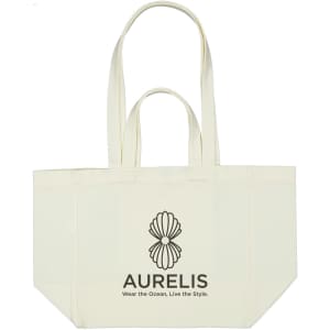A cream canvas bag with two long handles and a large logo on the front.