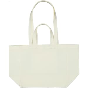 A cream-coloured canvas bag with two sturdy handles and a spacious interior. It features a simple design with no visible branding.