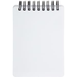 A pocket-sized notebook with a spiral binding and blank pages.