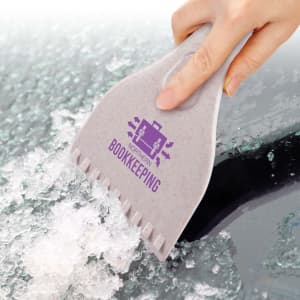 A grey eco ice scraper with a textured handle removing ice from a car windscreen, featuring a logo.