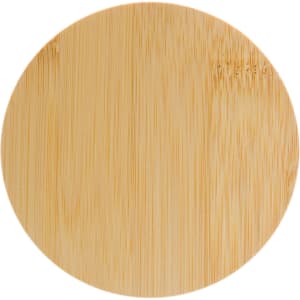 A round bamboo lid for a candle, featuring a smooth surface and natural finish.