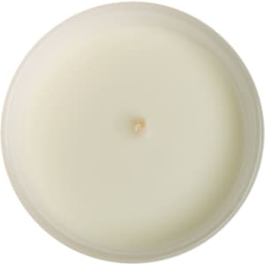 A large glass candle with a smooth white surface and a central wick.