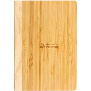 A Bamboo Notebook with a natural wood finish, featuring a logo that reads "Auntie's Pet Shop."