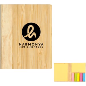 Bamboo sticky notes holder with various sticky notes in yellow, pink, and green, featuring a logo.