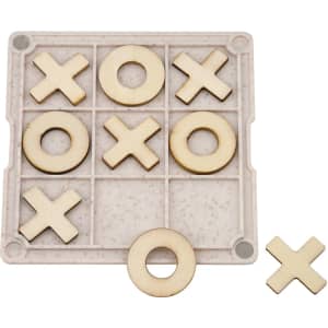 A Noughts & Crosses coaster featuring a light-coloured board with natural wood pieces. It has a logo on the side.