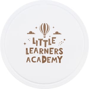 A round white promotional item featuring the text "Little Learners Academy" in brown with a hot air balloon and stars.