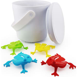 A white container with a lid and four plastic jumping frogs in blue, red, yellow, and green.