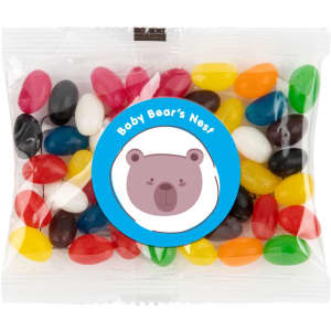 A cello bag filled with assorted color mini jelly beans, including red, yellow, green, black, and white candies.