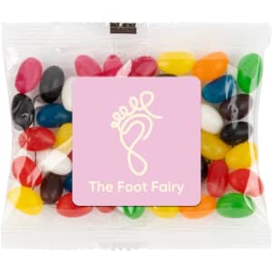 A cello bag filled with assorted color mini jelly beans, including red, yellow, green, and black candies.