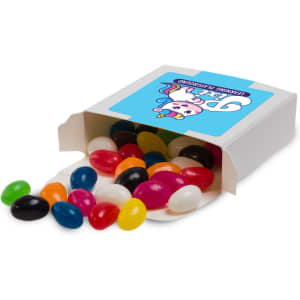 Assorted jelly beans in vibrant colors, scattered from a 50g box with a playful design.