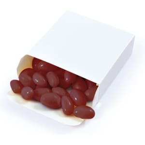 A white box filled with red jelly beans spilling out, featuring a simple design without any branding.
