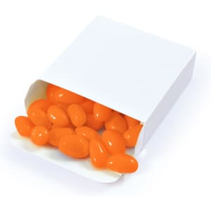 An open white box filled with bright orange jelly beans spilling out.