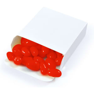 A box of red jelly beans is opened, with some candies spilling out onto a white background. The box is plain and has a logo.