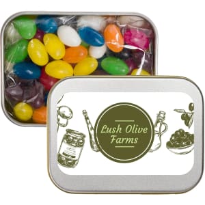 A silver rectangular tin filled with assorted color mini jelly beans, featuring a label that reads "Lush Olive Farms."