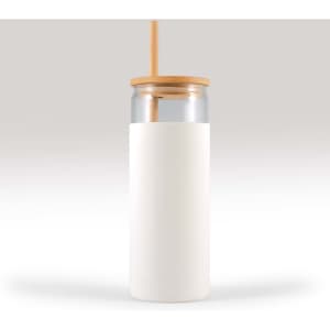 A Pisa Glass Tumbler featuring a clear glass body, a bamboo lid, and a straw, complemented by a white sleeve.