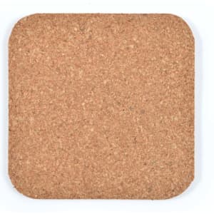 A square cork coaster in a natural brown color, featuring rounded edges and a textured surface.