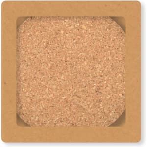 A round cork coaster in a square holder, showcasing a natural brown color and textured surface.
