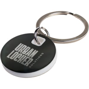 A circular stainless steel keytag in black and white, attached to a metal keyring. It features a logo.