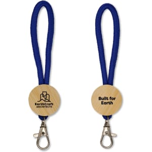 A wooden keytag with a blue fabric strap and a metal clip, featuring a branding logo on one side.