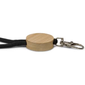 A round wooden keytag with a black rope and a metal clip, featuring a natural bamboo finish.