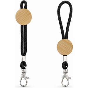 A keytag with a round wooden accent and a black rope strap, featuring a metal clasp for attachment.