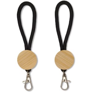 A keytag featuring a round wooden element with a black rope attachment and a metal clip.