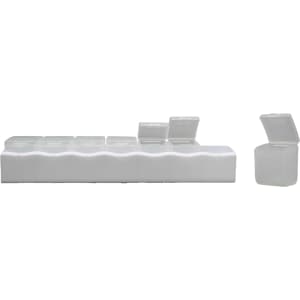 A white weekly pill box with individual compartments and clear lids, designed to organize medication for each day.