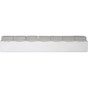 A clear weekly pill box featuring seven compartments for organizing medication, with a white base.