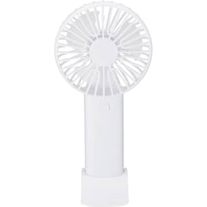 A portable white fan with a circular head and a vertical handle, resting in a stand.