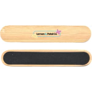 A bamboo nail file with a smooth side and a textured side, featuring a logo and a light natural wood colour.