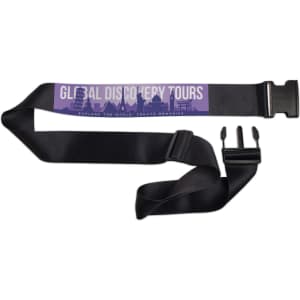A black luggage strap featuring a textured design and a buckle closure. It has a logo and branding elements.