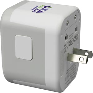 A travel adaptor in white with a square design and a branded logo on one side.