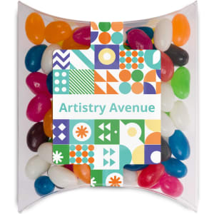 A pillow pack filled with assorted mini jelly beans in various colors, including red, blue, green, and yellow.