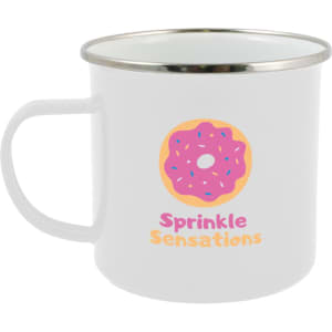 A white enamel mug featuring a colorful donut design and a logo. The mug has a shiny metal rim.