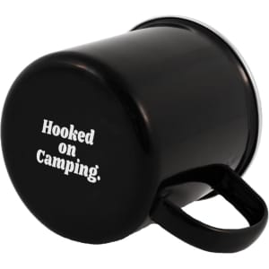 A black enamel mug with a handle and a logo on the bottom. Ideal for outdoor use.