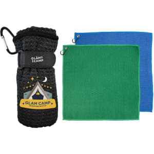 A black drink bottle with a logo, accompanied by green and blue travel towels.
