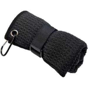 A folded black travel towel secured with a strap and carabiner, featuring a textured surface.