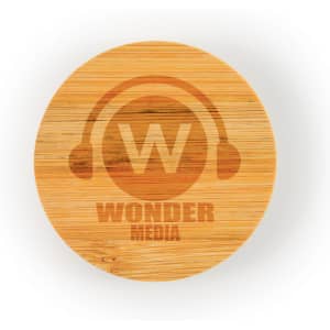 A round bamboo coaster features an engraved logo with the text "WONDER MEDIA" and a headphone graphic.