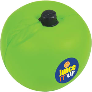 A green apple-shaped stress reliever with a black nozzle on top and a logo sticker.