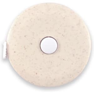 A beige circular tape measure with a smooth surface and a central button, featuring a logo.