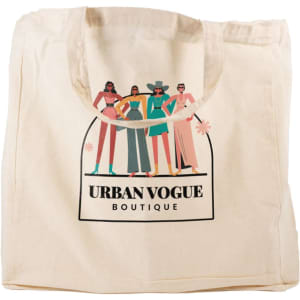 A short handle calico bag in cream featuring a logo and a colorful illustration of fashionable figures.