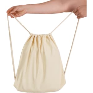 A cream drawstring backpack with a cinched opening, held by a hand. It features a simple design and a logo.