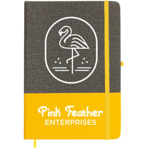 A grey and yellow A5 notebook with an illustration of a flamingo and a logo on the cover.