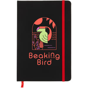 A black A5 notebook with a red elastic band, featuring a colorful bird design on the cover and a logo.